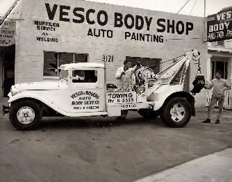 Don Vesco stands beside his father's tow truck (Source: teamvesco.com)