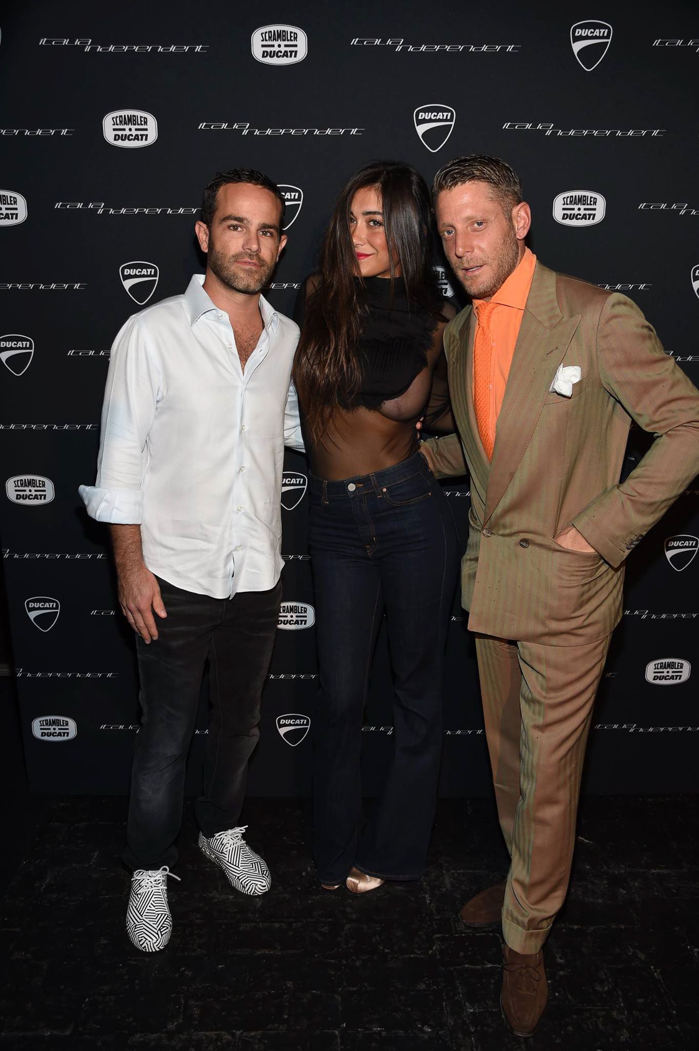 Lapo Elkann with stylish crowd at the Art Basel launch of the Ducati Scrambler Italia Independent