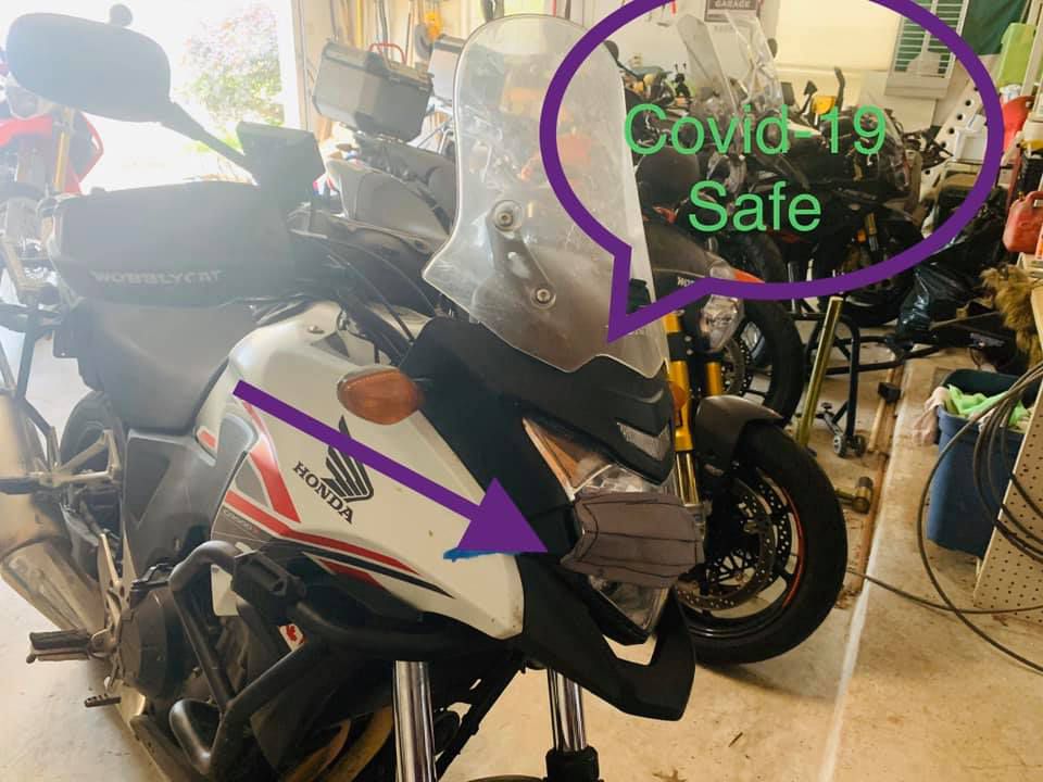Natalia sent me a photo of my CB500X with a mask to show me they were keeping my bike safe!