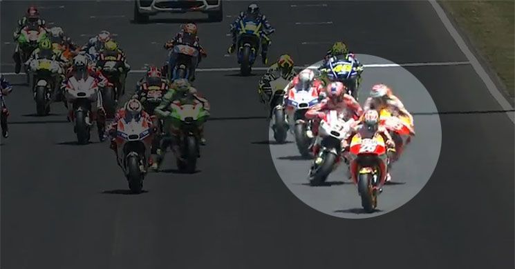 Petrucci trading paint with Marquez at the race's start