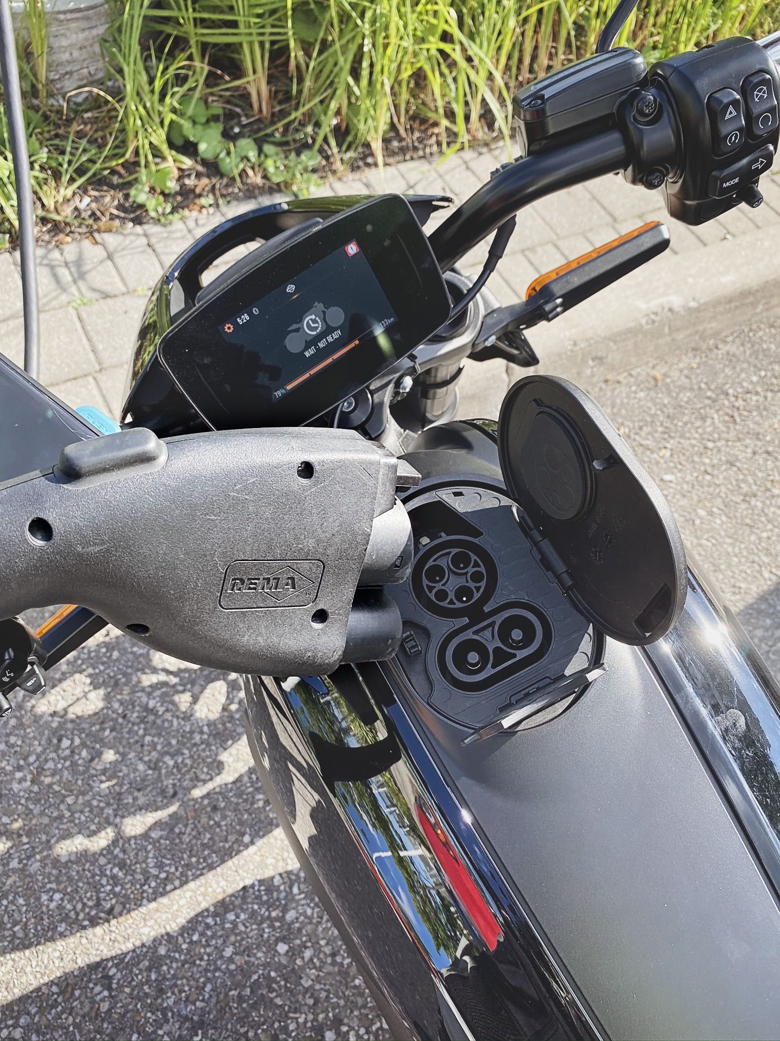 The LiveWire uses the standard J-1772 port so you can use any EV charging station