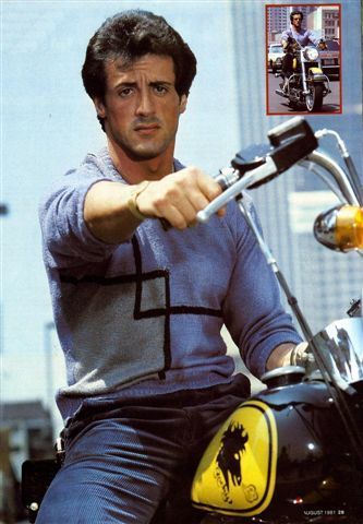 Sylvester Stallone with a "please don't leave me baby because you don't like my motorcycle" look on his face.