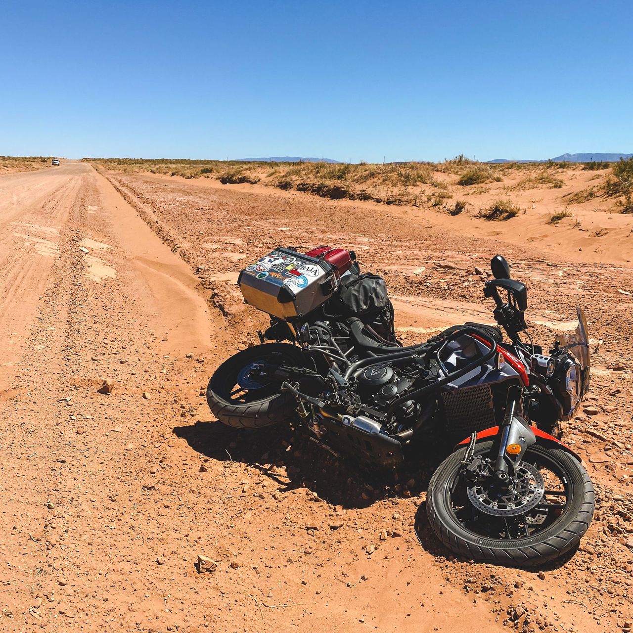 I had a get-off after I hit a deep section of sand. Unwritten rule of adventure riding: Take photos first! Navajo Nation, Arizona.