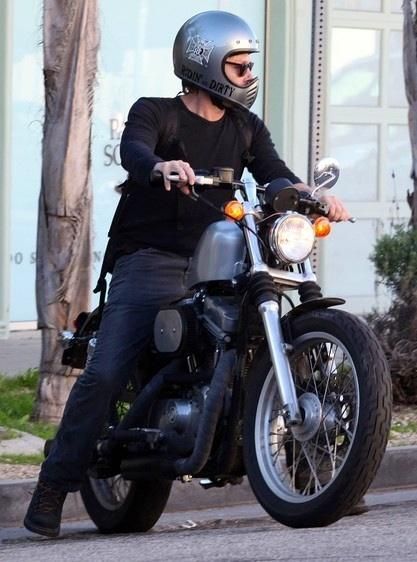 Norman Reedus riding his Harley