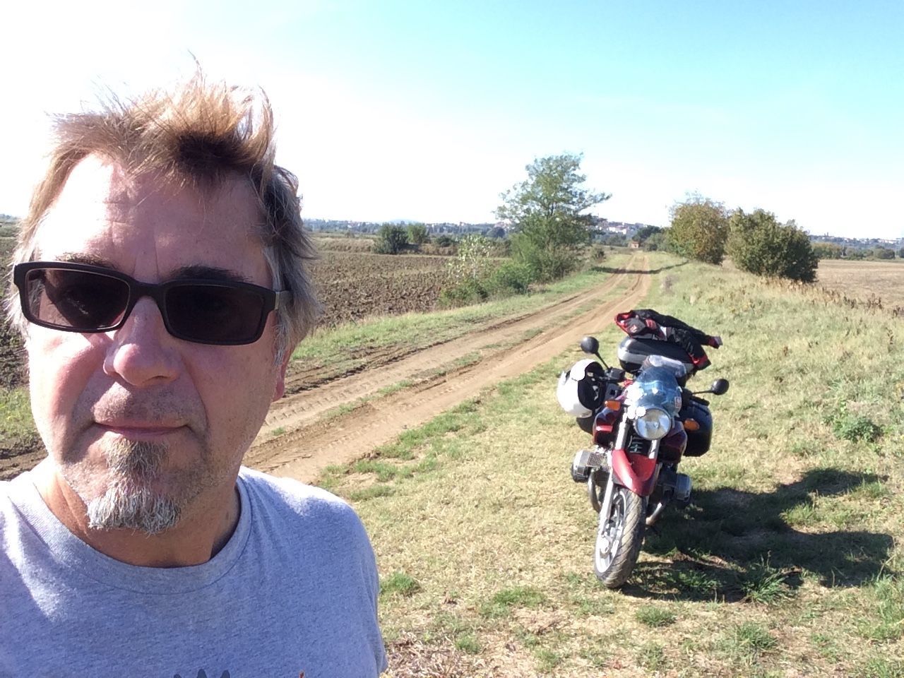 Solo backroading in Tuscany on a BMW R1150R running street tires, without incident 