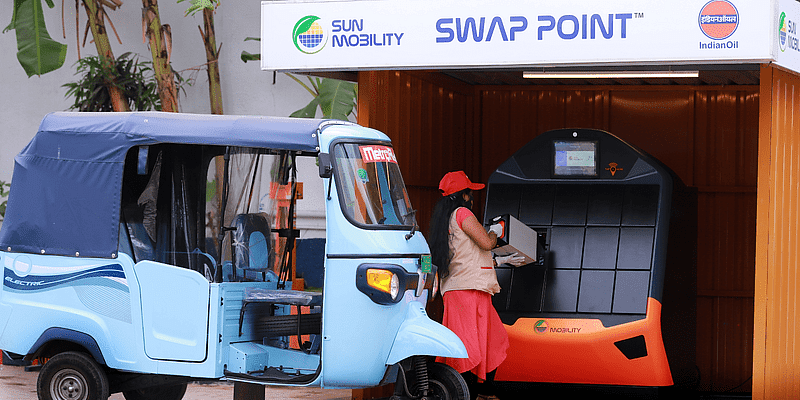 Sun Mobility Electric Tuk Tuk battery swapping point, India.