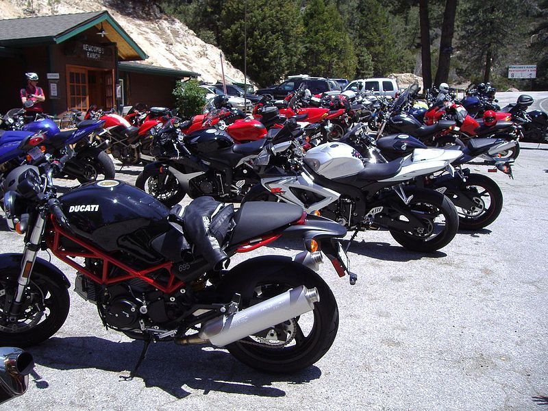 Ducati Monster, GSX-R and other motorcycles in lot at Newcomb's Ranch