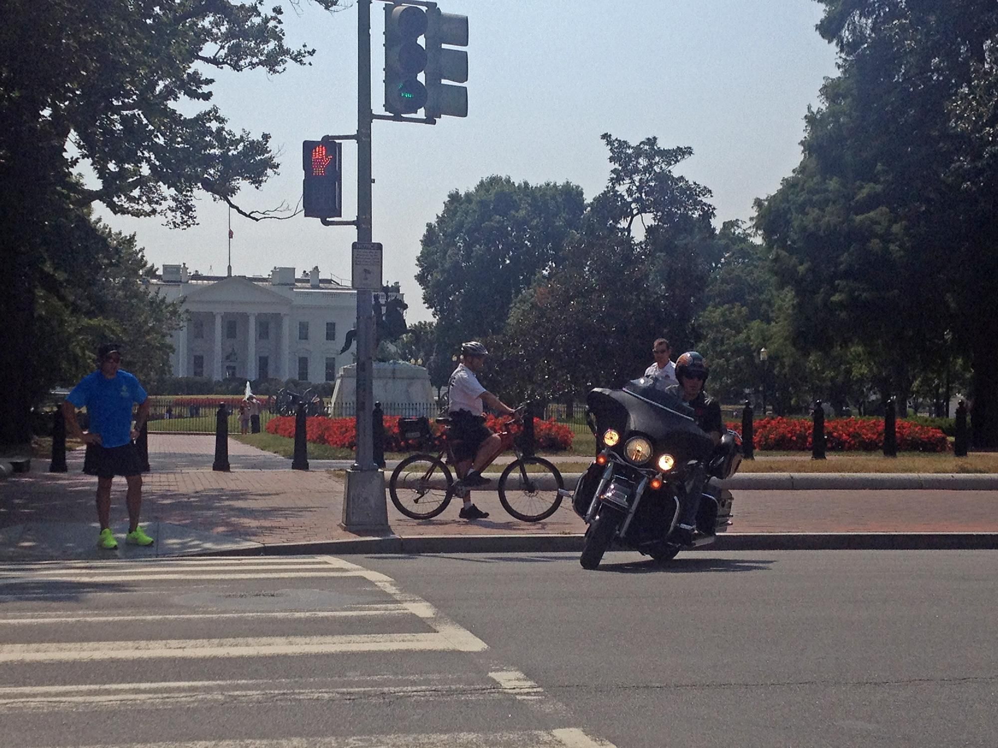Biker turning in front of the White House