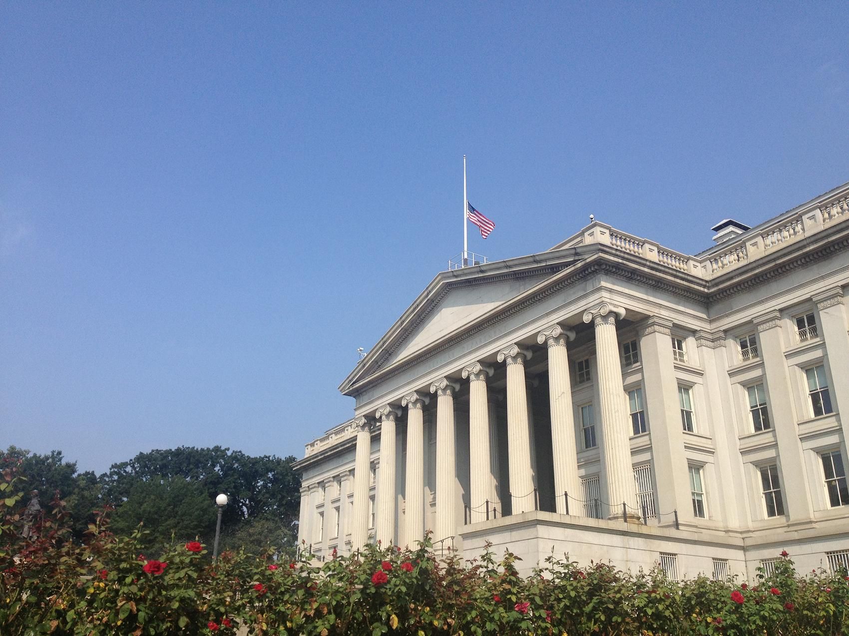 Flag at the U.S. Dept of Treasury flying at half-mast today